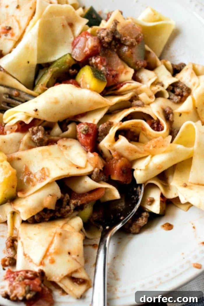 A beautiful presentation of Easy Beef Ragu and Pasta, ready to be enjoyed, highlighting the rich sauce and tender pasta.