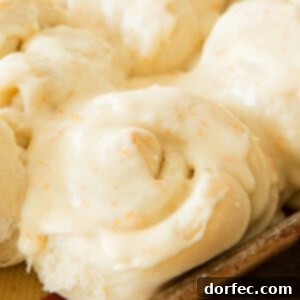 Our favorite recipe for perfectly fluffy orange rolls with a delightful citrus glaze.