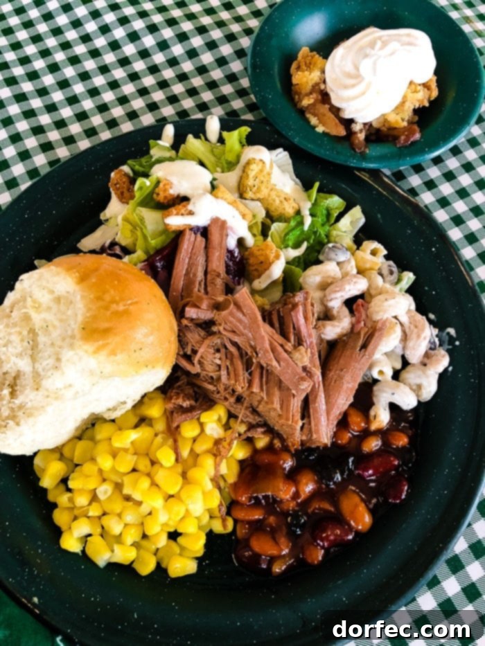 Buffet spread with BBQ meats and sides on the Moab Dinner Cruise