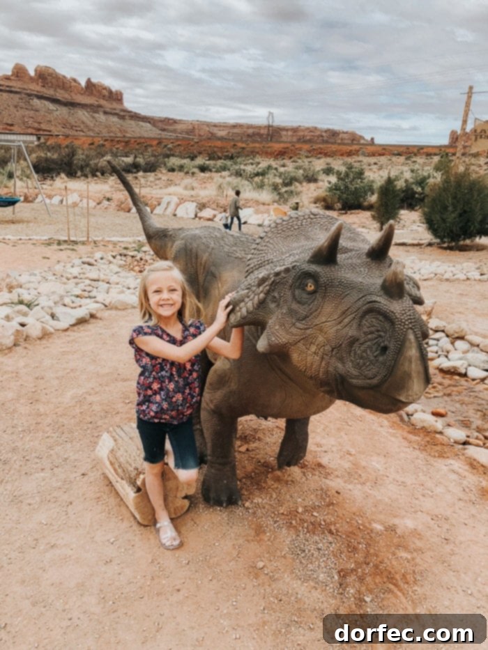 Moab Giants entrance with dinosaur statues, perfect for family fun