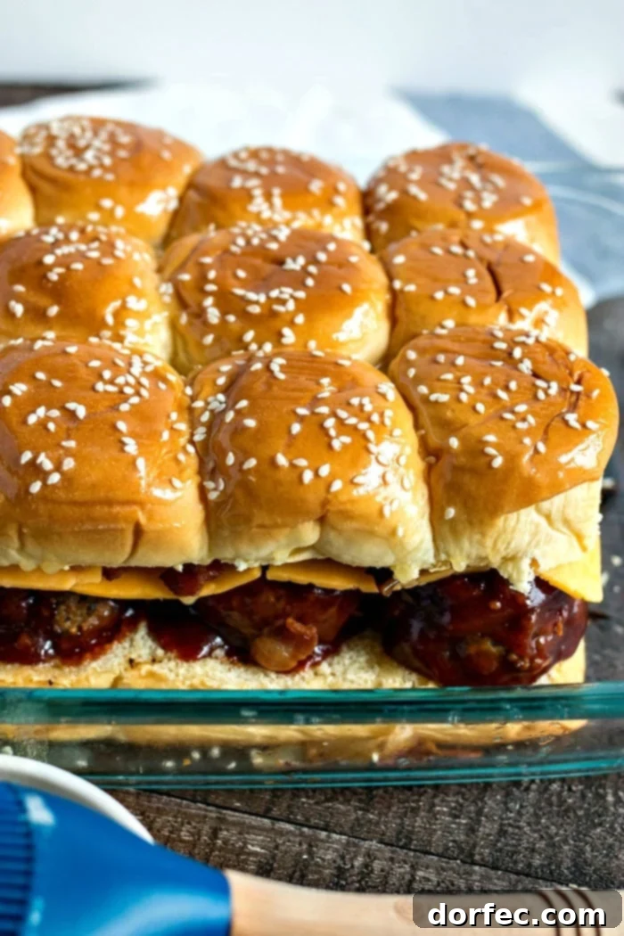 unbaked bbq meatball sliders in pyrex baking dish