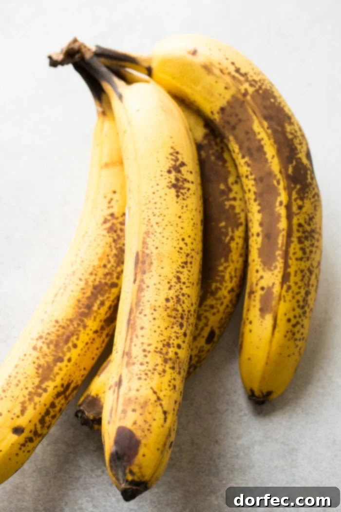 Overripe bananas with extensive brown spots, perfect for baking