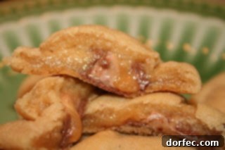 A vibrant close-up of several warm, gooey Milky Way cookies, freshly baked and arranged artfully, highlighting their soft centers and delicious aroma.