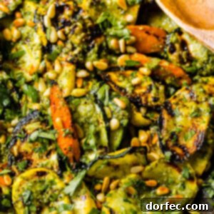 Grilled vegetables with pesto, parsley, and toasted pine nuts - a delicious and quick recipe.