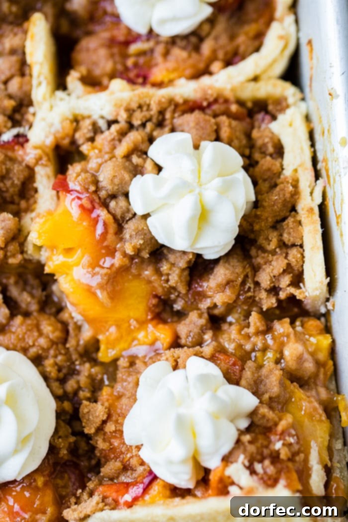 Pan filled with golden-brown Brown Sugar Peach Pie Bars fresh from the oven