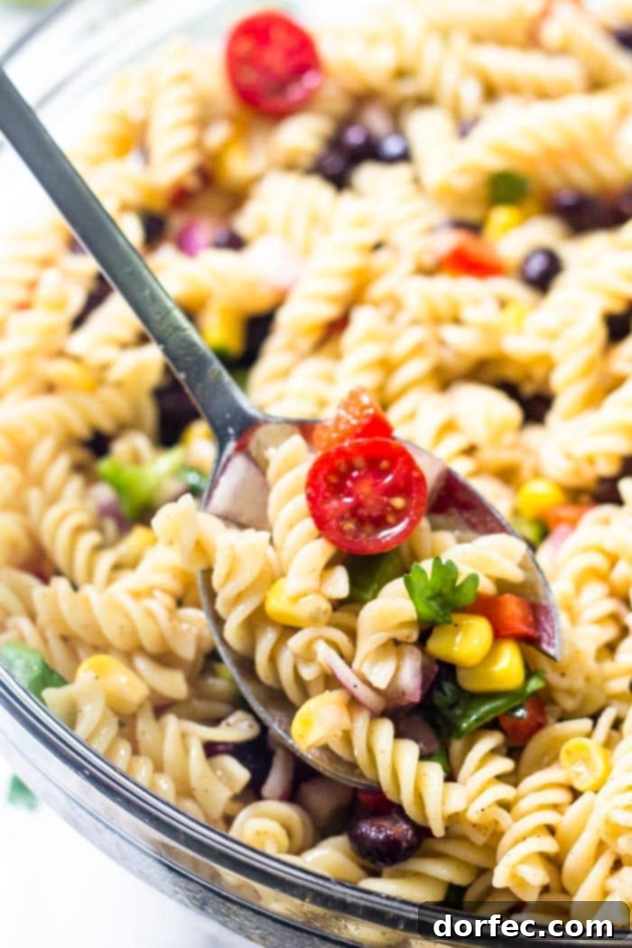 Zesty Tex-Mex Pasta Salad 5 Every spoonful of Southwest pasta salad is packed with colorful tomatoes, black beans, corn, and peppers, all coated in a zesty dressing.