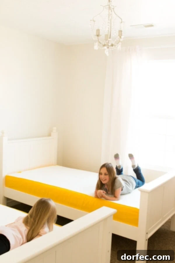 Before shot of an empty tween bedroom showing basic mattress and box spring