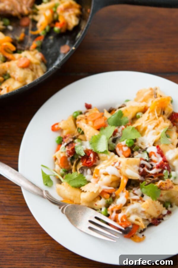 Assortment of colorful sautéed vegetables in a skillet for cheesy pan fried tortellini