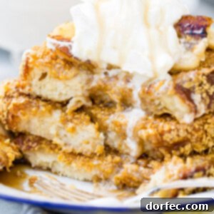 Cades Signature Bananas Foster French Toast 12 A delectable shot of Bananas Foster French Toast, ready to be served.