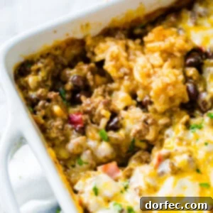 Cheesy Taco Rice and Beef Bake 8 A freshly baked Mexican Cheesy Ground Beef and Rice Casserole.