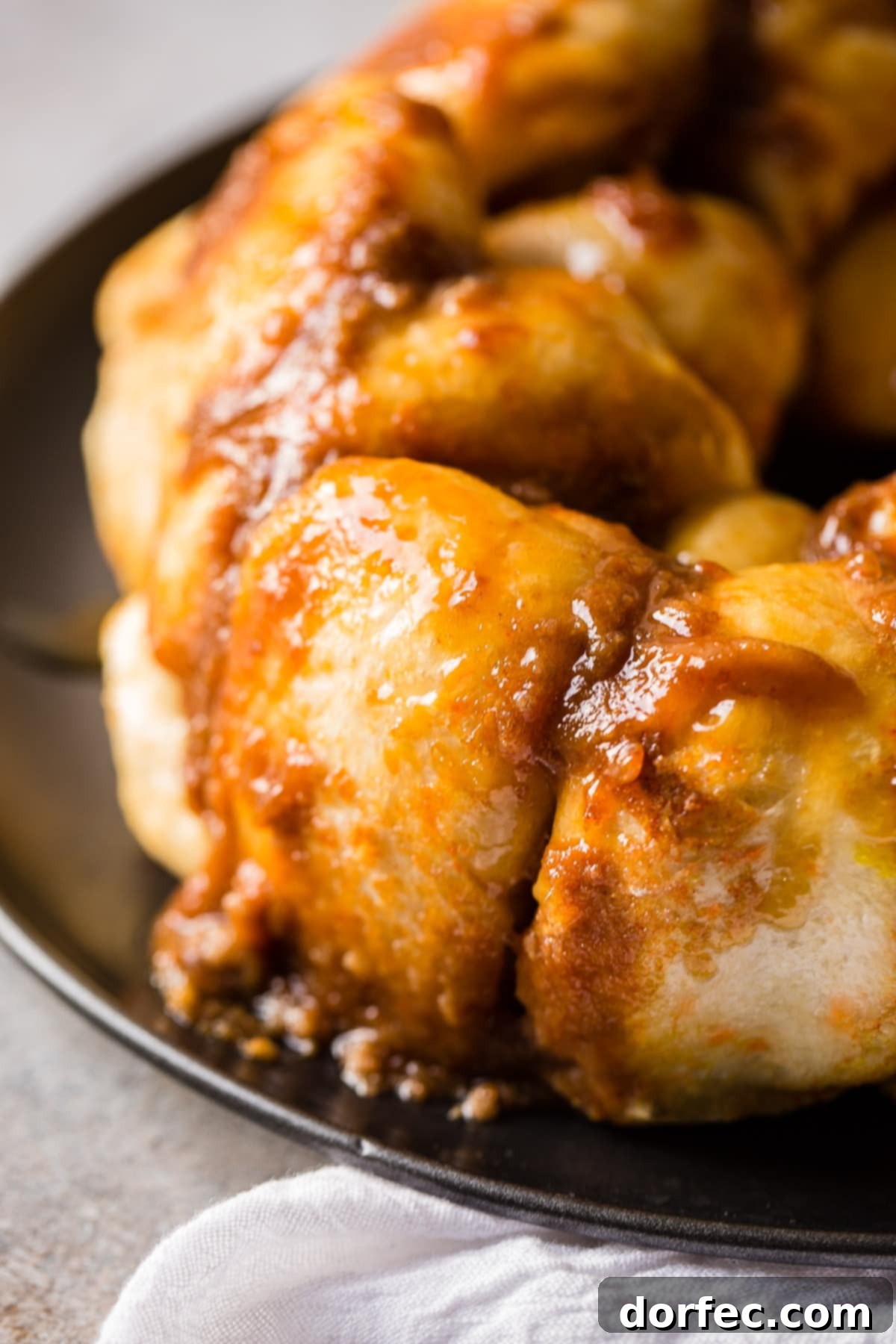 Mom's Sticky Buns: A 4-ingredient recipe for soft, light, and seriously delicious monkey bread. Perfect for breakfast or brunch!