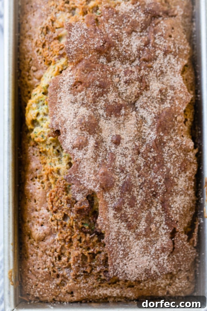 A close up of the best zucchini bread recipe with cinnamon sugar topping