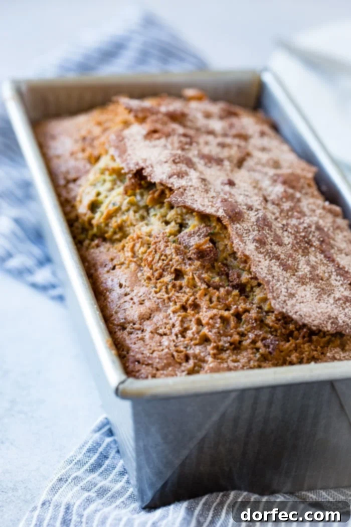 A close up of the best zucchini bread recipe with cinnamon sugar topping