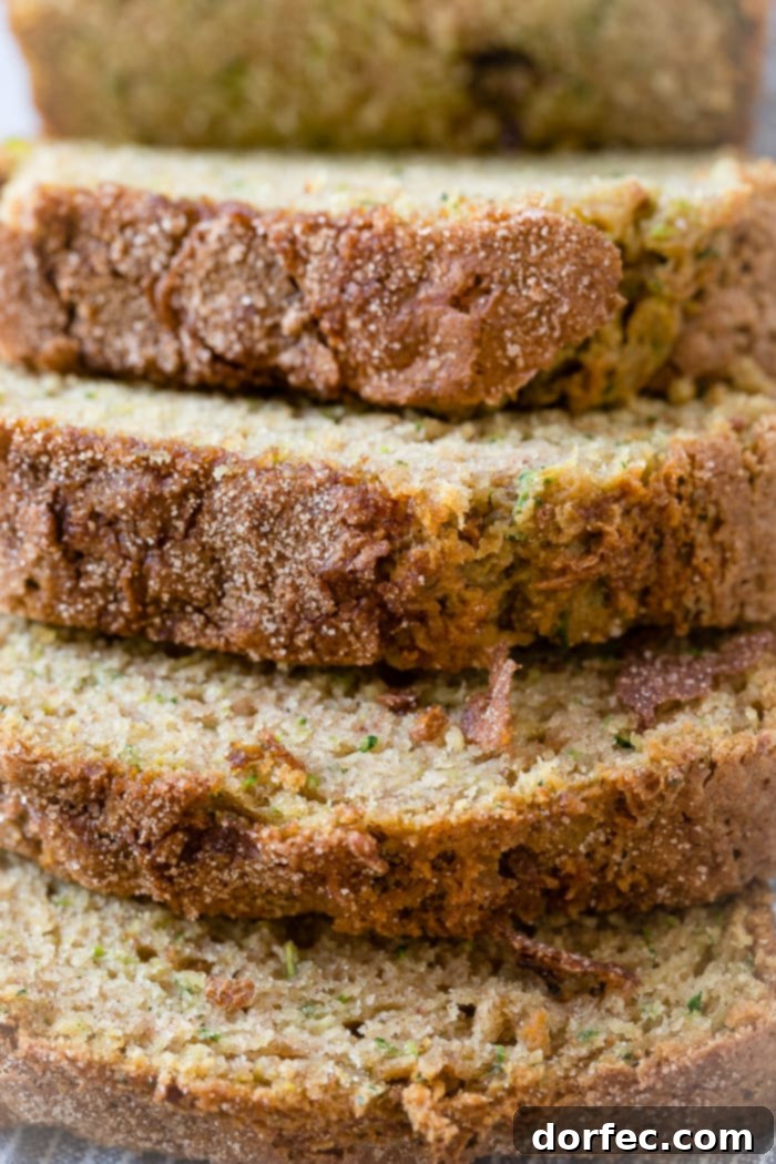 A close up of the best zucchini bread recipe with cinnamon sugar topping