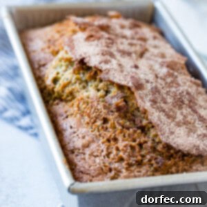 A beautifully baked loaf of The Perfect Zucchini Bread Recipe