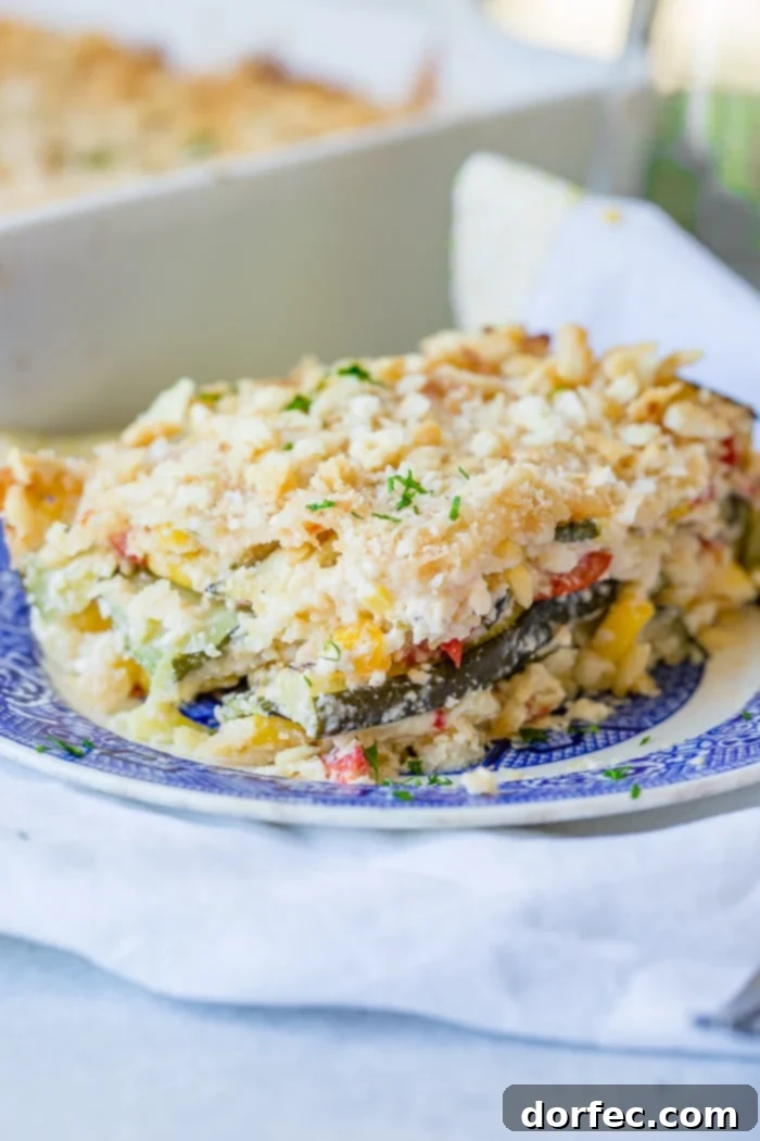 Golden Zucchini Corn Bake 6 A final close-up of a slice of Cheesy Zucchini Corn Casserole, perfectly golden and ready to be enjoyed.