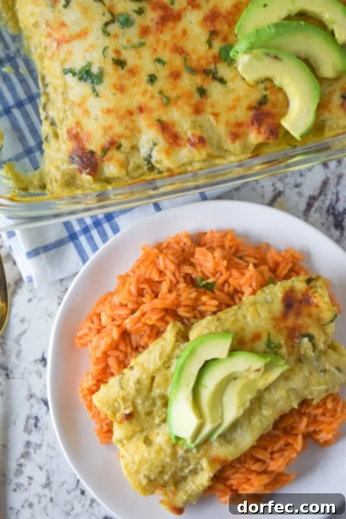 Cheesy chicken enchiladas baked with a homemade roasted tomatillo sauce.