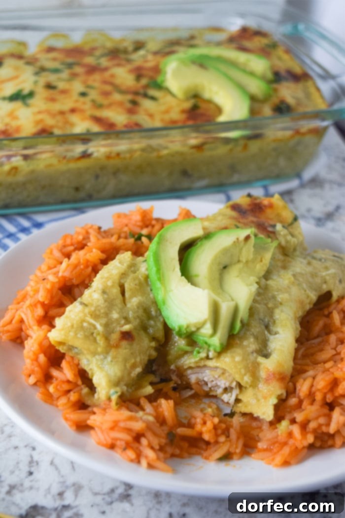 Cheesy chicken enchiladas baked with a homemade roasted tomatillo sauce.