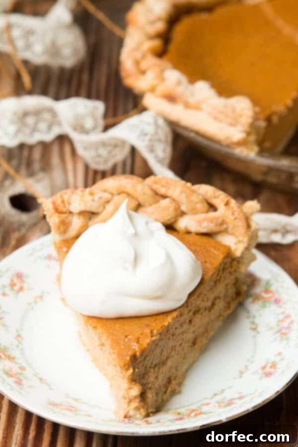 Our beloved, fail-proof Classic Pumpkin Pie Recipe, a staple for any holiday season, featured on ohsweetbasil.com.