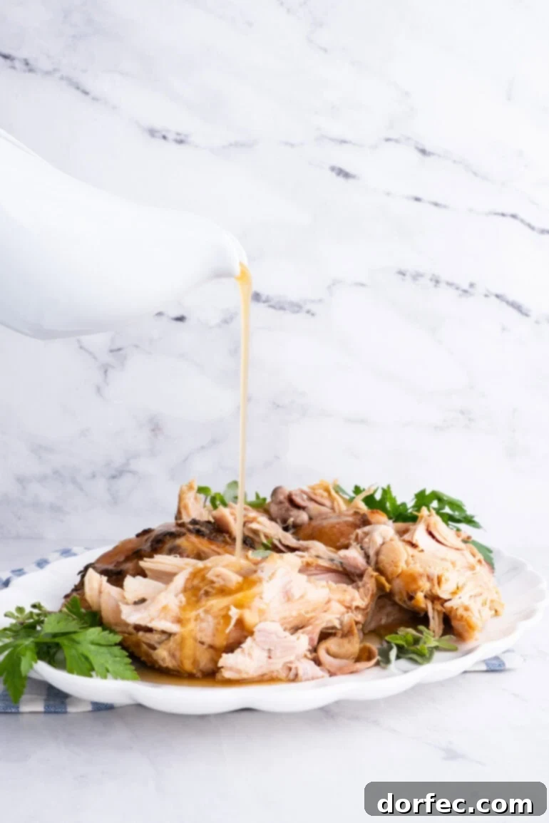 A large platter generously filled with juicy, tender turkey chunks, ready for serving at a holiday meal.