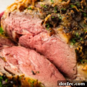 The Ultimate Prime Rib Recipe 6 garlic prime rib on a platter