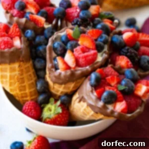 A visual representation of the Chocolate Dipped Waffle Cone Fruit and Yogurt Cups
