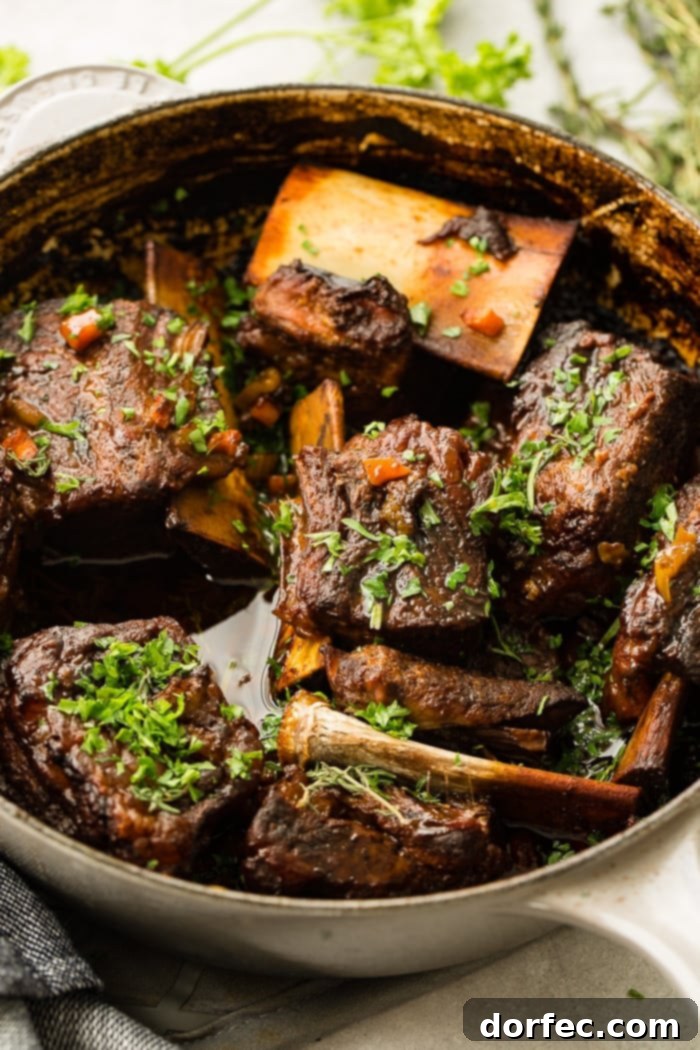 a le creuset dutch oven full of one pot braised beef short ribs