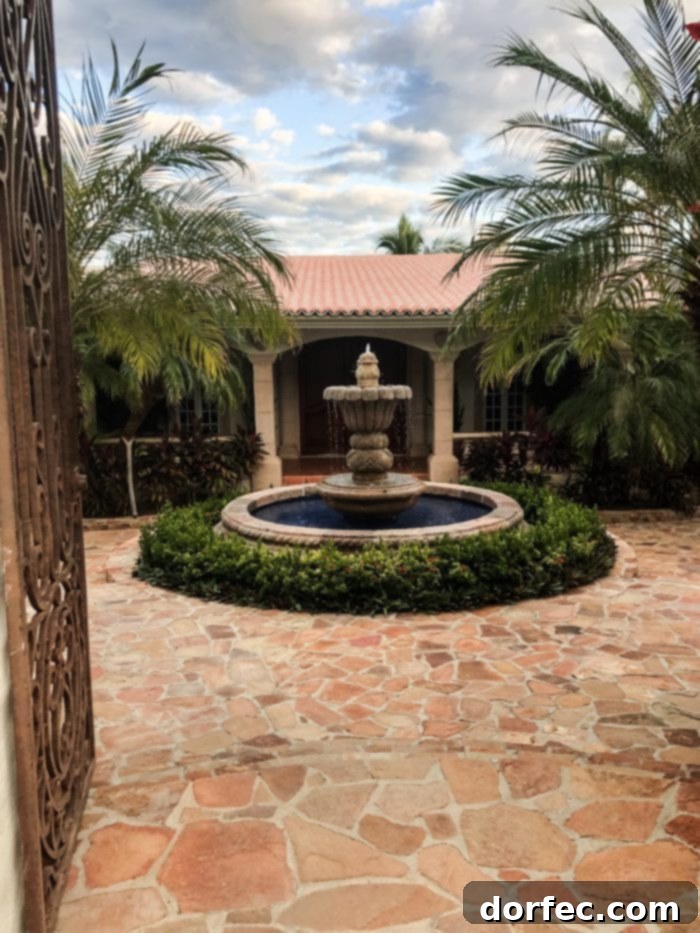 The grand facade of a Mexican luxury villa, Casa Mariposa, perfect for exclusive gatherings and family retreats in Los Cabos.