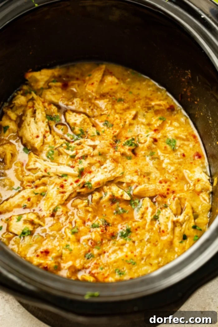 Sweet and Savory Pineapple Mexican Shredded Chicken Instant Pot or Slow Cooker 5 A delicious burrito bowl featuring pineapple Mexican shredded chicken, rice, beans, and fresh toppings