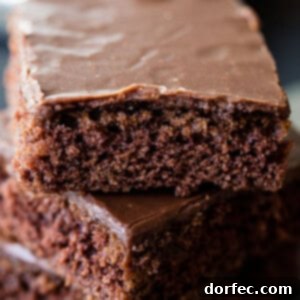 The classic chocolate sheet cake with a cooked chocolate frosting ohsweetbasil.com