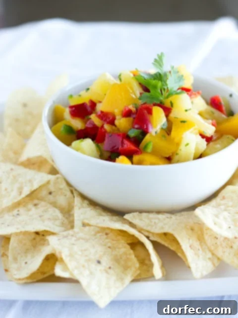 Homemade Peach Pineapple Salsa served with chips