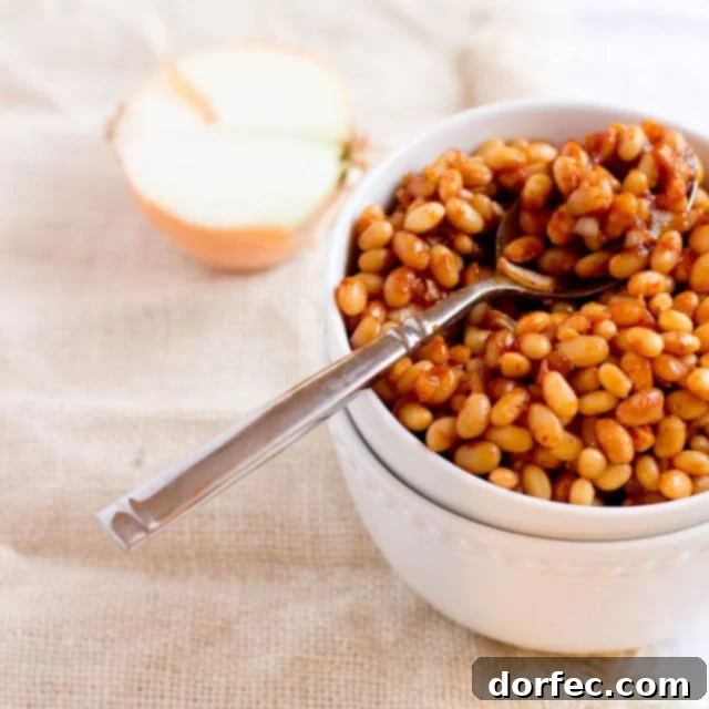 Slow-Smoked BBQ Beans 4 Close-up of perfectly smoked BBQ beans with a rich sauce
