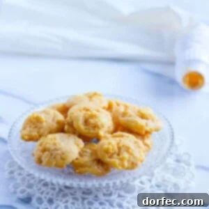Golden brown Southern Cheese Crackers arranged artfully on a serving dish
