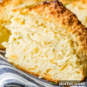 Whenever we have soup I need toppings or a good bread to go with it. This Garlic Cheddar Herb Irish Soda Bread is perfect for sopping up stew in the winter or on St Patrick's Day! Love a warm slice with butter! #bread #irish #cheddar #side #sodabread #cheddar #herb