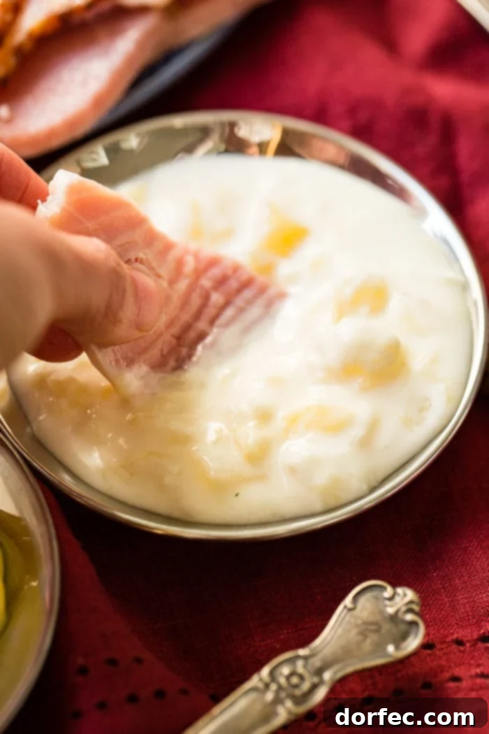 photos of someone dipping a small slice of ham in a little dish of honey mustard sauce