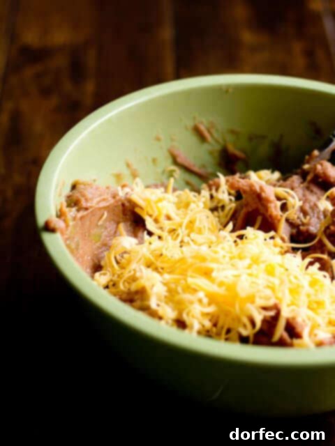 Bean and cheese smothered enchiladas ohsweetbasil.com