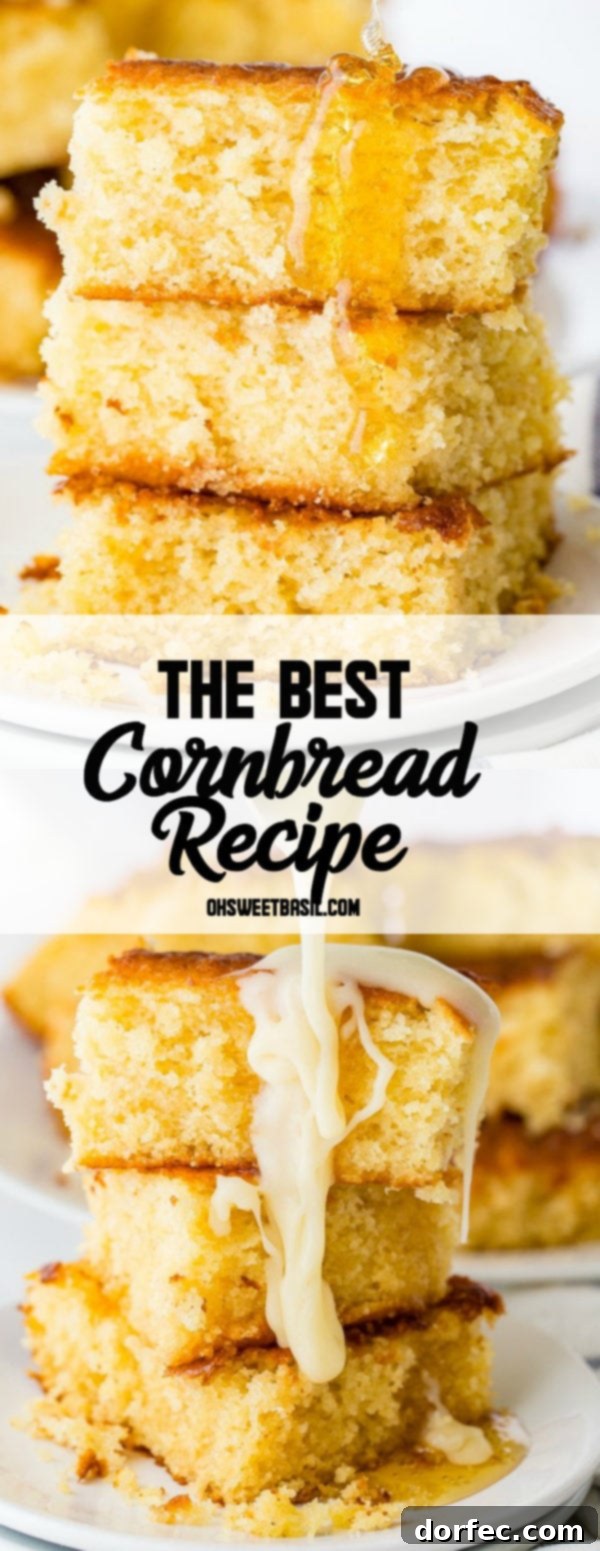 A person presenting a fresh piece of homemade sweet cornbread with honey butter.