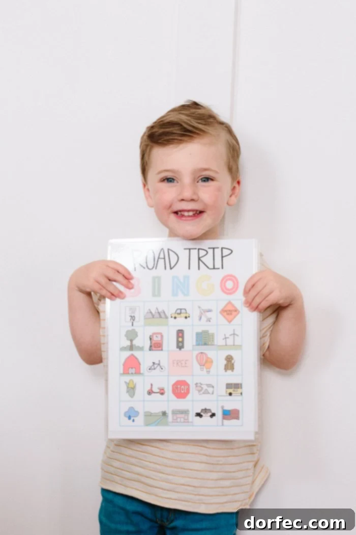 Road Trip Ready Smart Snacks and Fun Printables 6 A free printable bingo card designed for car trips, featuring various items to spot, is displayed alongside a compartmented snack box filled with small pieces of Tillamook Cheese and other healthy treats. This visual emphasizes fun entertainment and wholesome snacking for family travel.