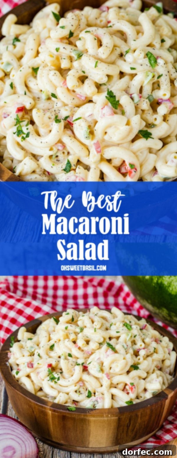 Ultimate Macaroni Pasta Salad Recipe 8 A wooden bowl on a red and white checkered napkin full of creamy macaroni salad, highlighting its perfect texture and fresh ingredients.