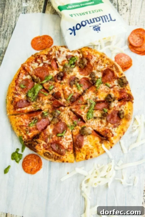 A photo of a pesto pepperoni grilled pizza.