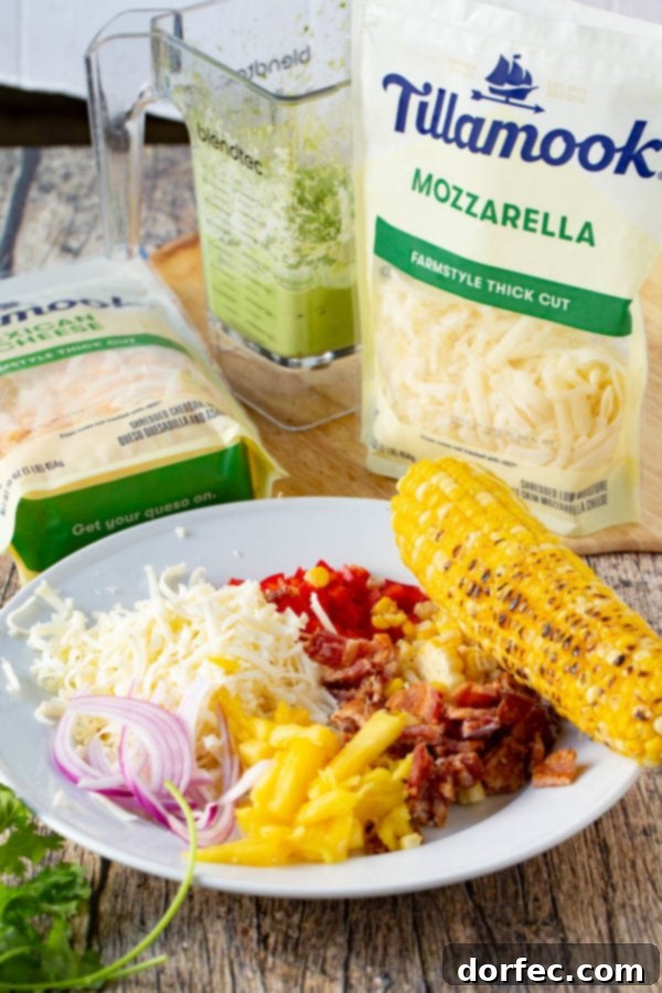 Pulled Pork Pizza with Sweet Corn and Cilantro Cream A photo of all the ingredients prepped for pulled pork pizza.