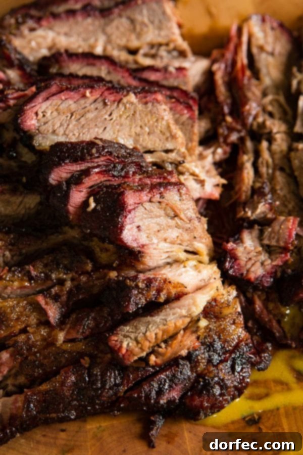 A photo of perfectly smoked beef brisket sliced and ready to devour.