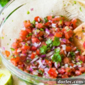 A vibrant bowl of fresh Pico de Gallo, ready to be served.