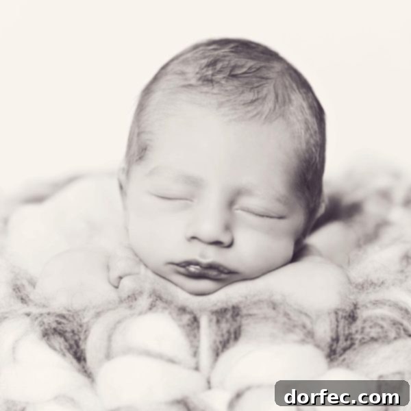 A newborn photo of our little guy on a furry blanket, symbolizing hope and new beginnings.