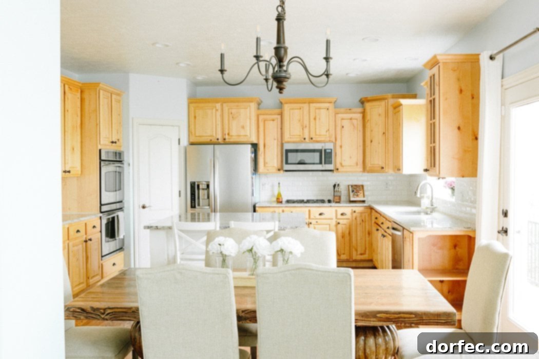 Old kitchen with dysfunctional island and cabinets, highlighting the need for a modern, organized redesign