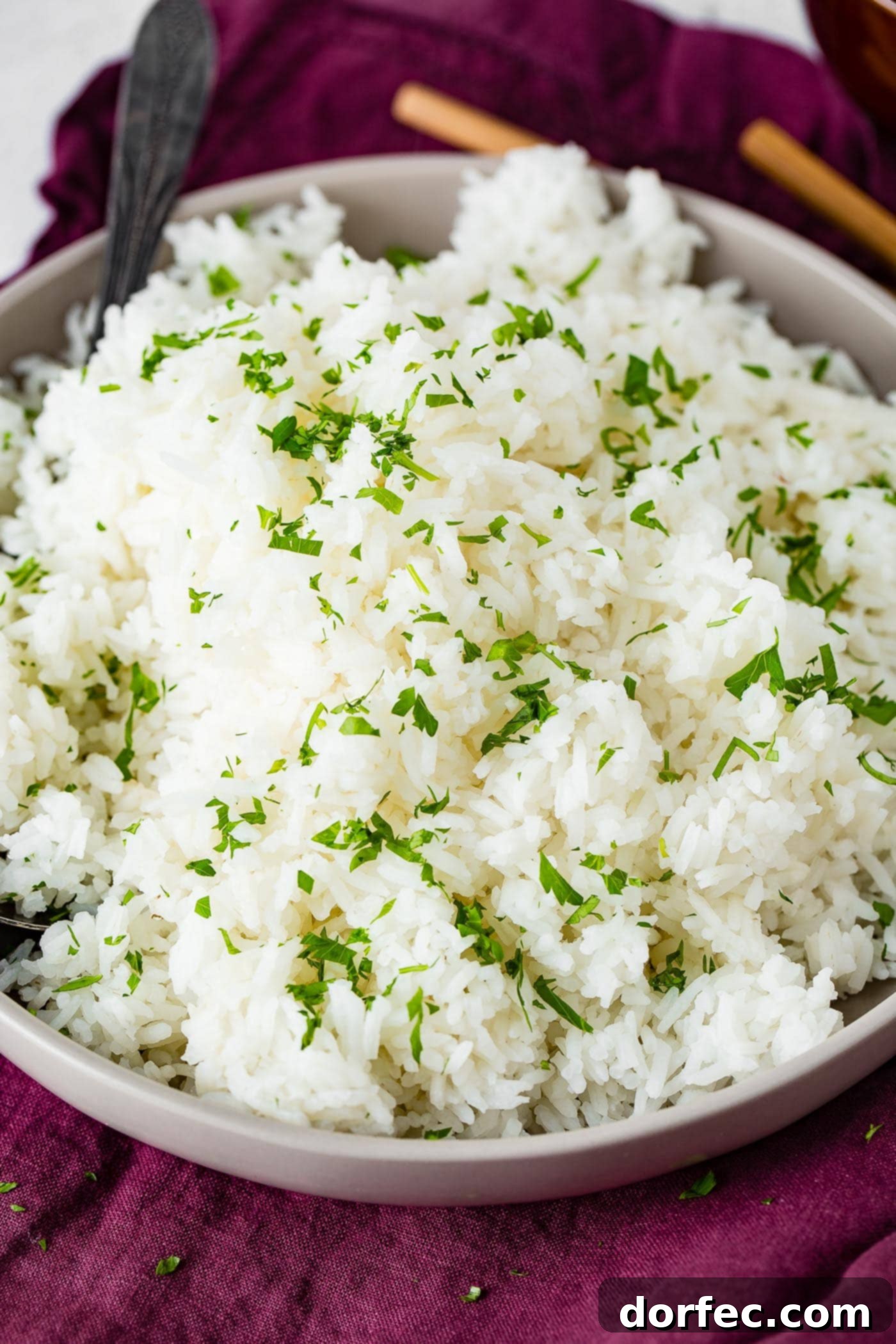 Fluffy White Rice Made Simple 3 a close-up of perfectly cooked long grain white rice, showing individual fluffy grains
