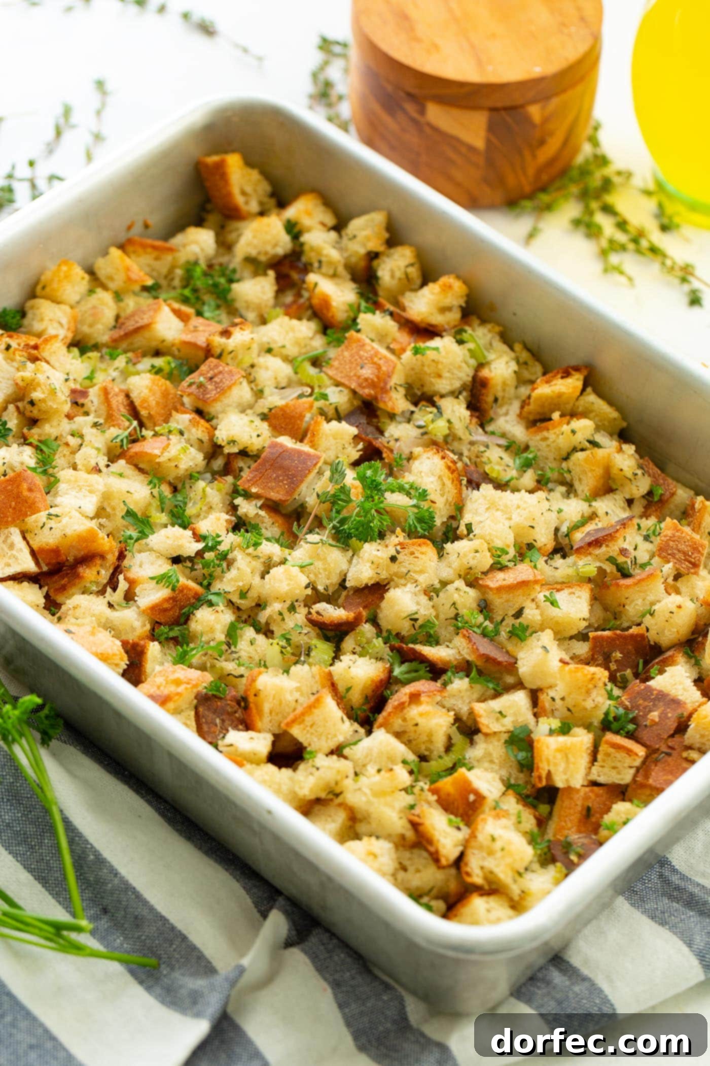 A photo of classic stuffing in a baking dish, perfectly golden and ready to be enjoyed.