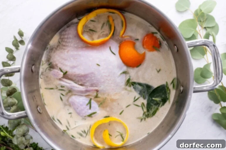 A photo of a large stock pot containing a raw turkey soaking in a flavorful brine solution, ready for refrigeration.