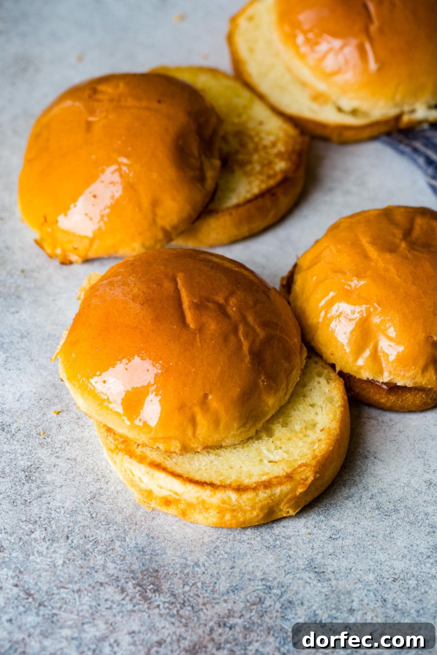 Philly Cheesesteak Sloppy Joes A photo of perfectly toasted brioche buns, golden brown and ready to be filled with the sloppy joe mixture.