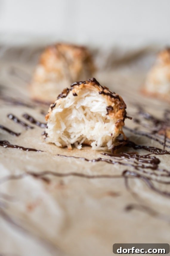 freshly baked coconut macaroons on a cooling rack